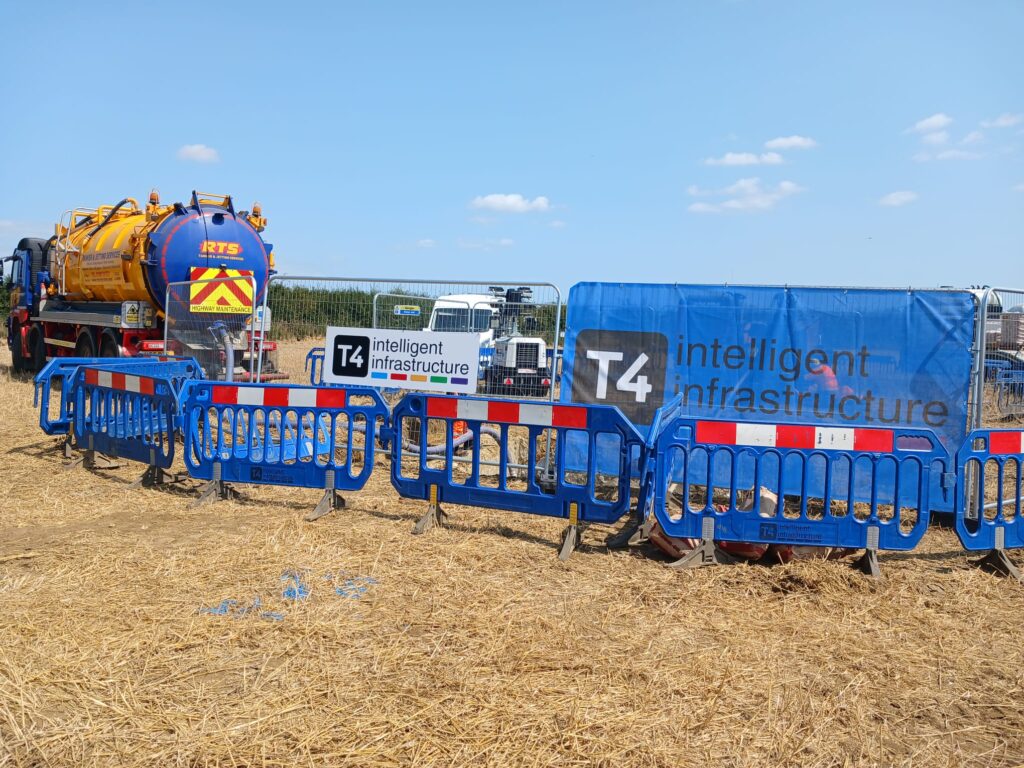 T4 welfare unit and tanker behind site barriers