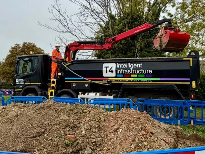T4 grab lorry loading excavated spoil on site